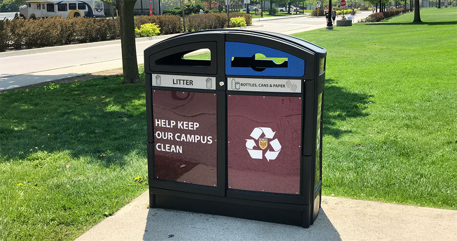Custom dual-stream waste and recycling bin at McMaster University campus, branded with signage to promote litter reduction and sustainable waste management in public spaces